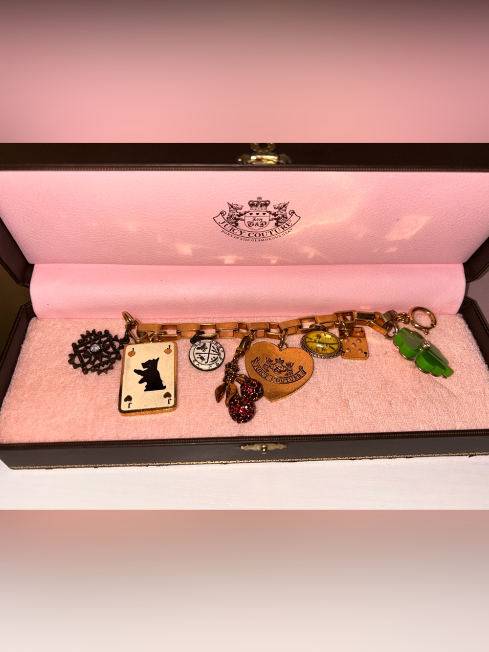 Juicy Couture Pink Charm Bracelet with Antique Gold Accents